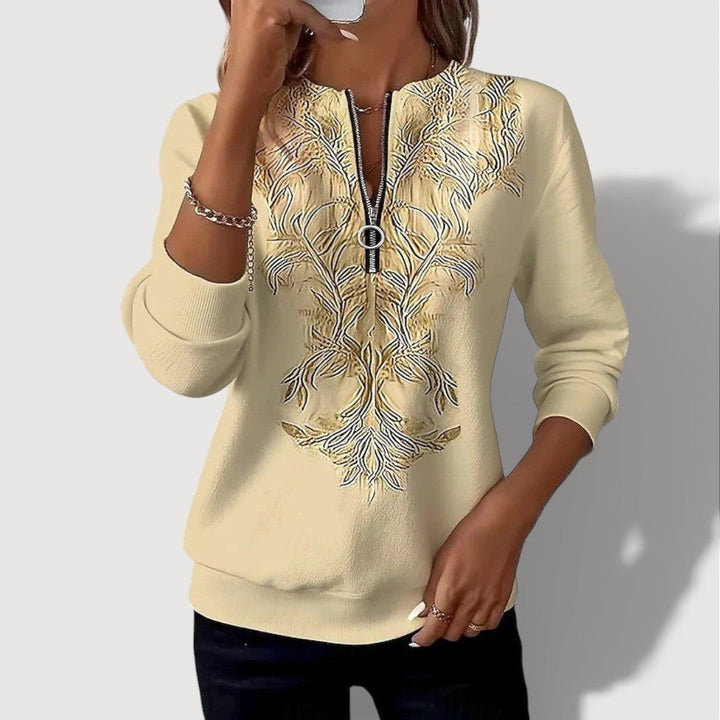 GENIEVA – EMBROIDERED ZIP TOP